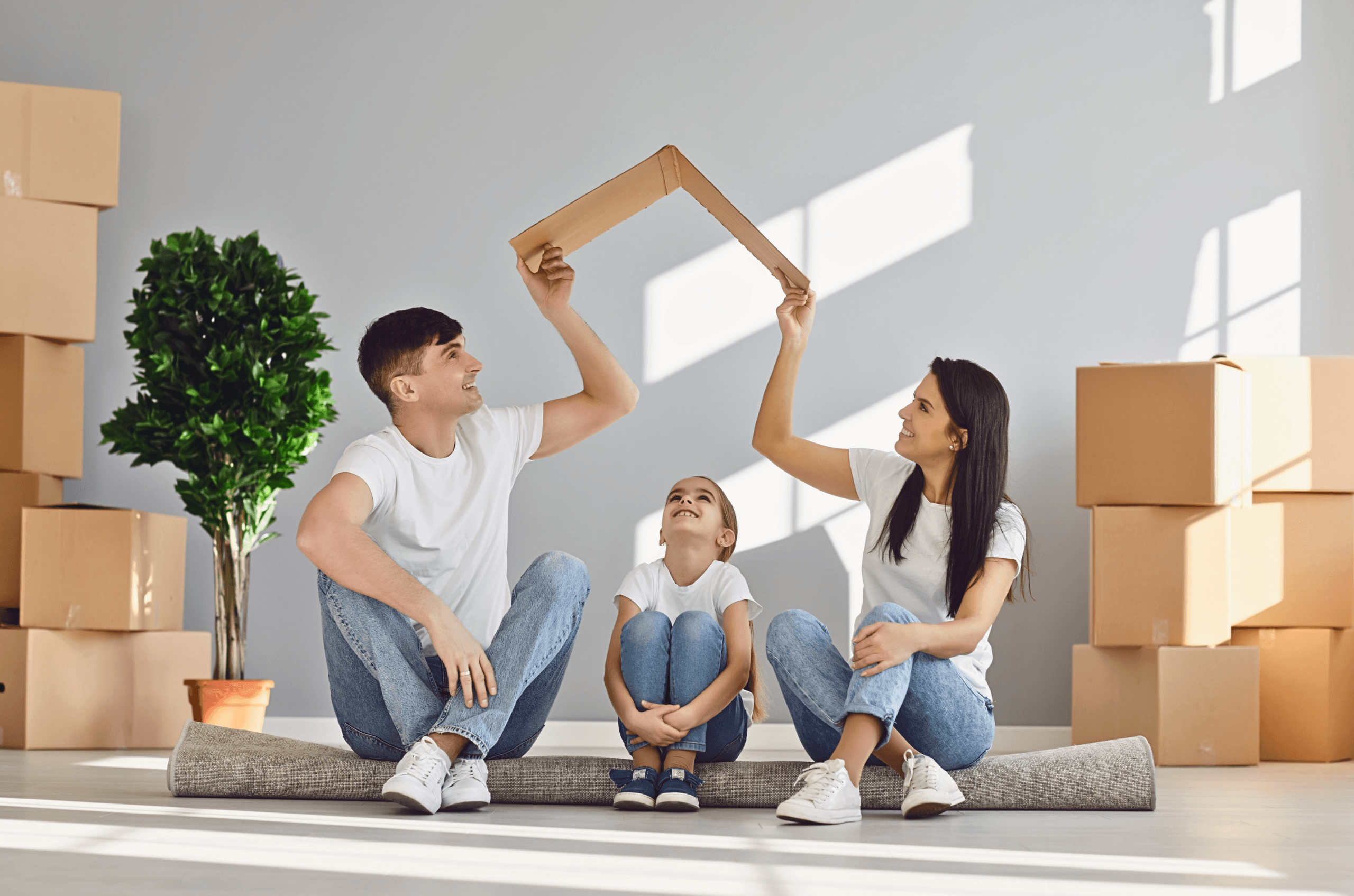 Happy family after they moved from one home to another